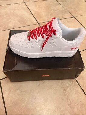 Supreme White Leather Low-Top Sneakers with Red Logo Laces